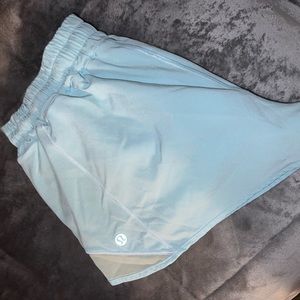 Ice blue lululemon hotty hot shirts 2” with reflective sides